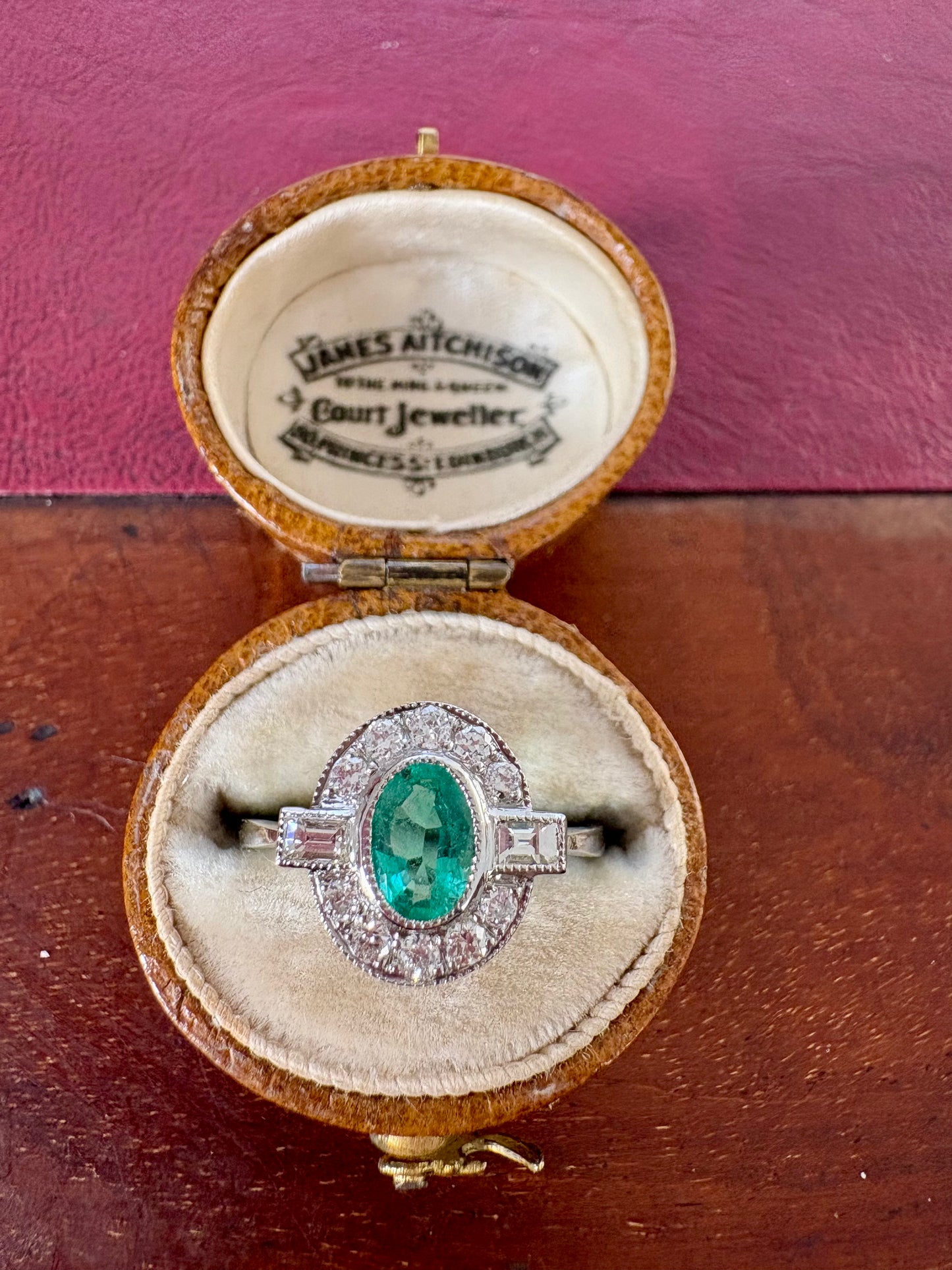Wonderful Modern Platinum, Emerald and Vari-cut Diamond Ring