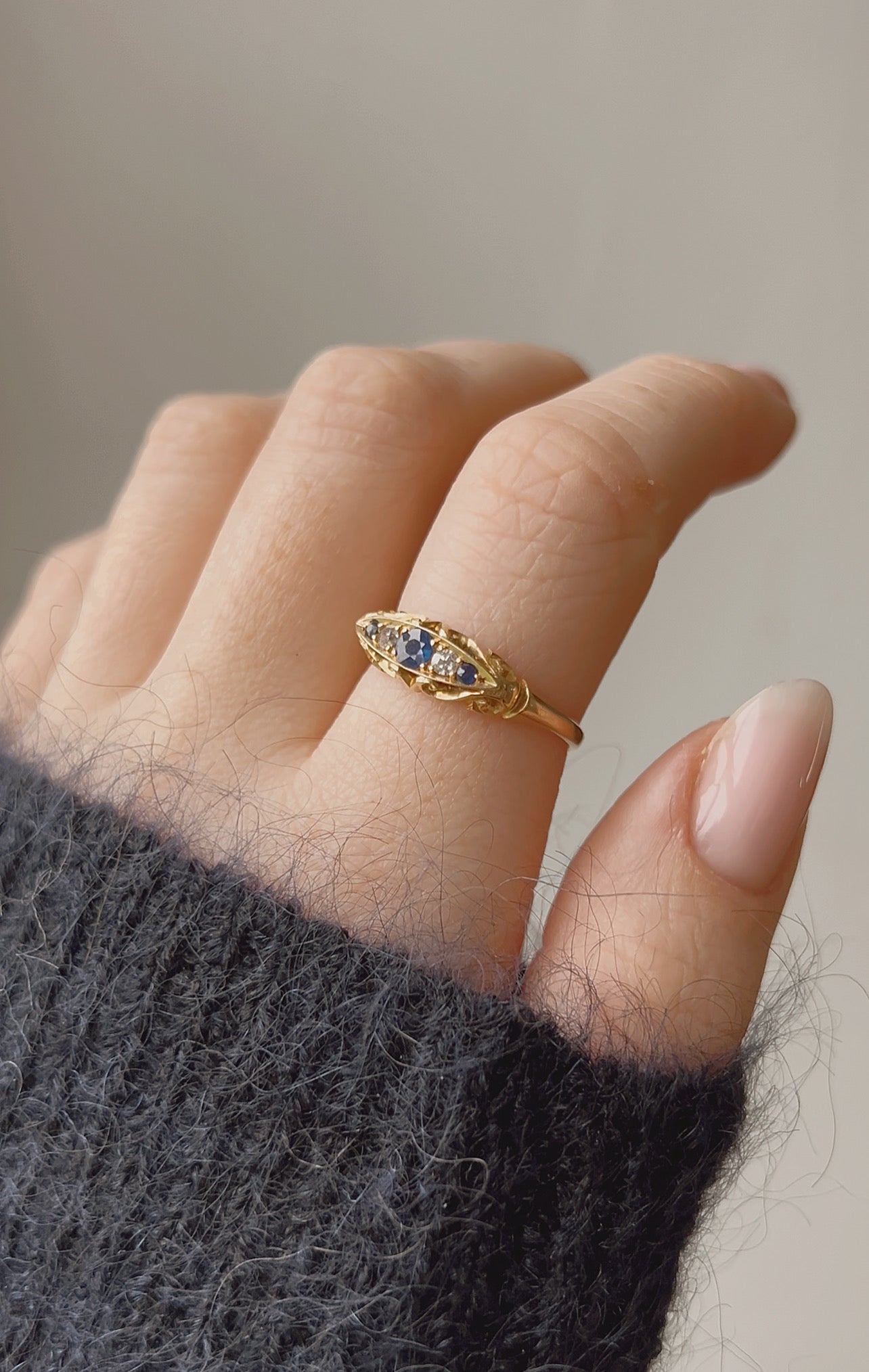 A lovely Early 20th Century 18ct Gold, Blue Sapphire and Diamond Five Stone Ring