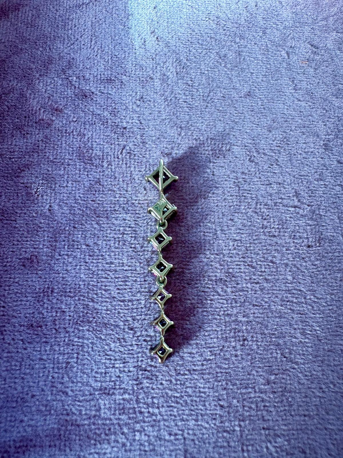 Pretty Modern Garnet Pendant in 9K Gold