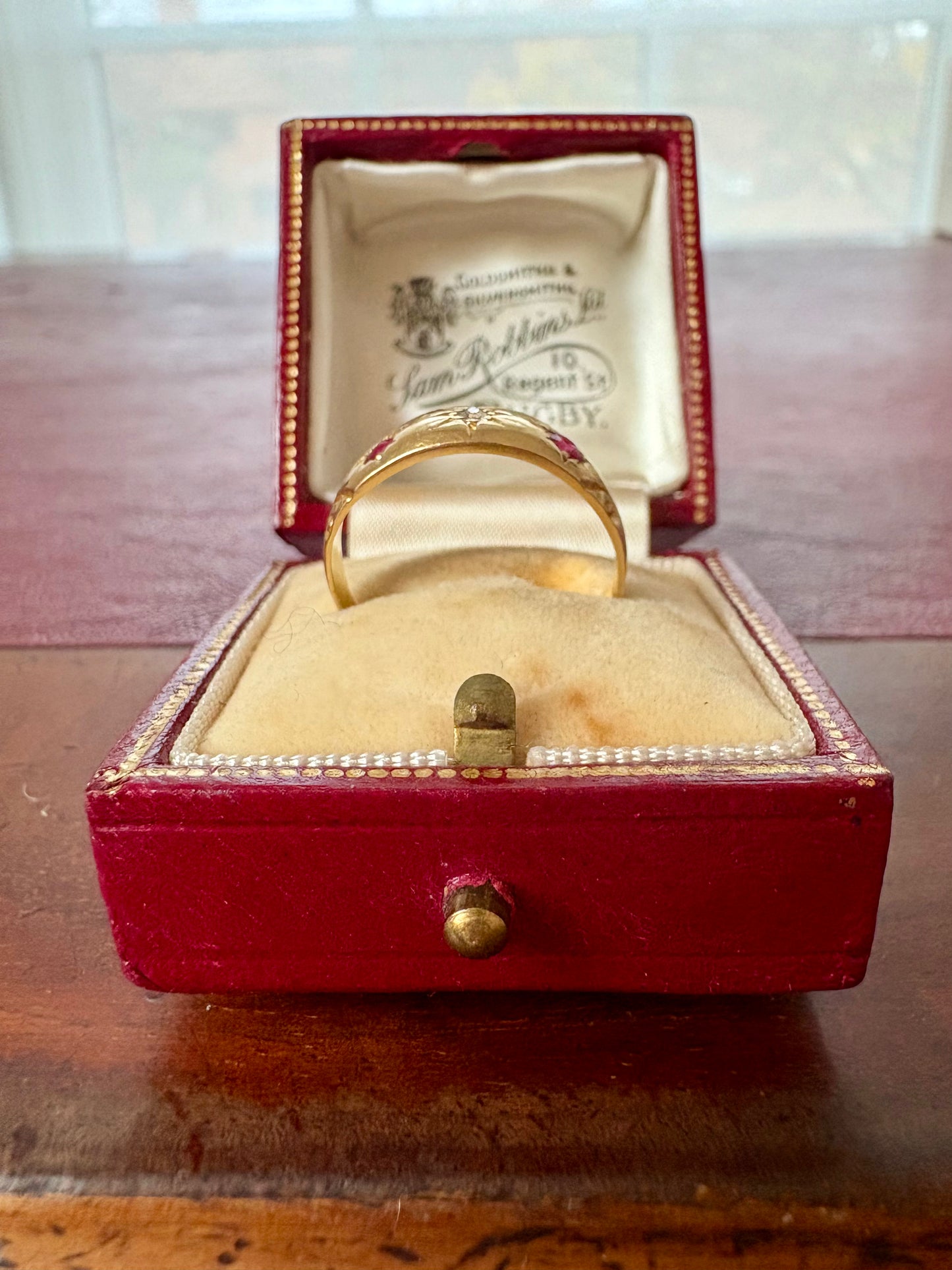 Gorgeous Early 20th Century Gold, Ruby and Diamond Starburst Ring