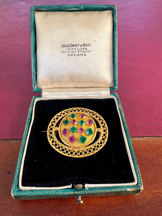 Striking Gilt Brooch with Pink and Green Stones