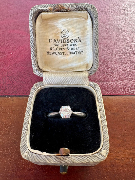 Classic Modern Platinum and Solitaire Diamond Ring