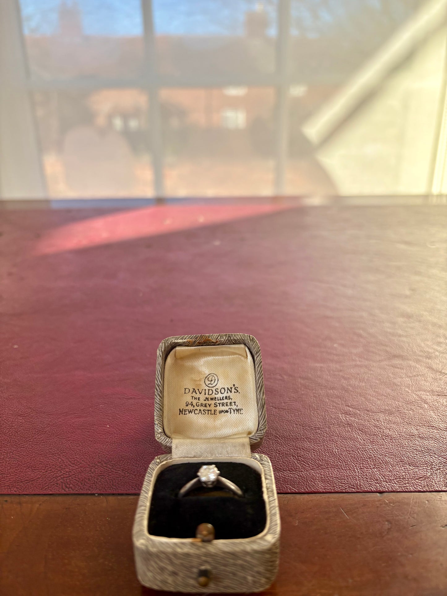 Classic Modern Platinum and Solitaire Diamond Ring