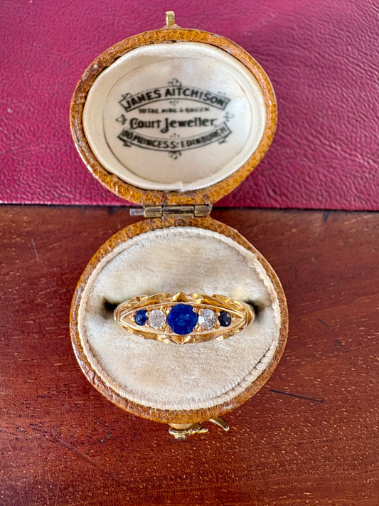 A lovely Early 20th Century 18ct Gold, Blue Sapphire and Diamond Five Stone Ring