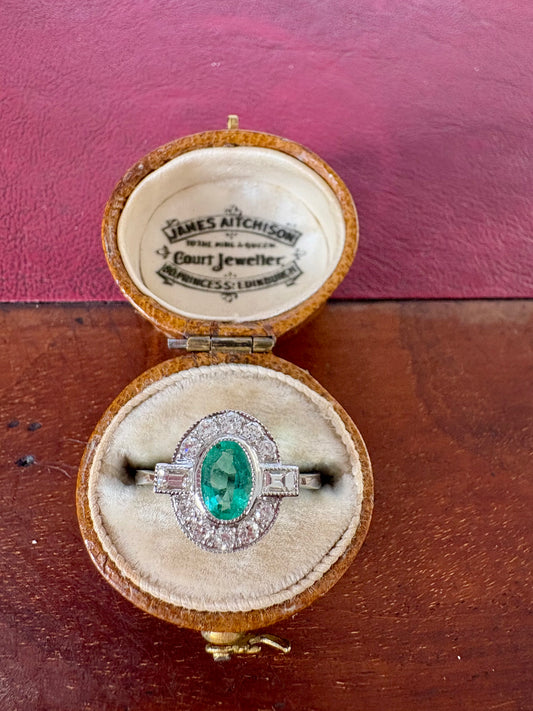 Wonderful Modern Platinum, Emerald and Vari-cut Diamond Ring