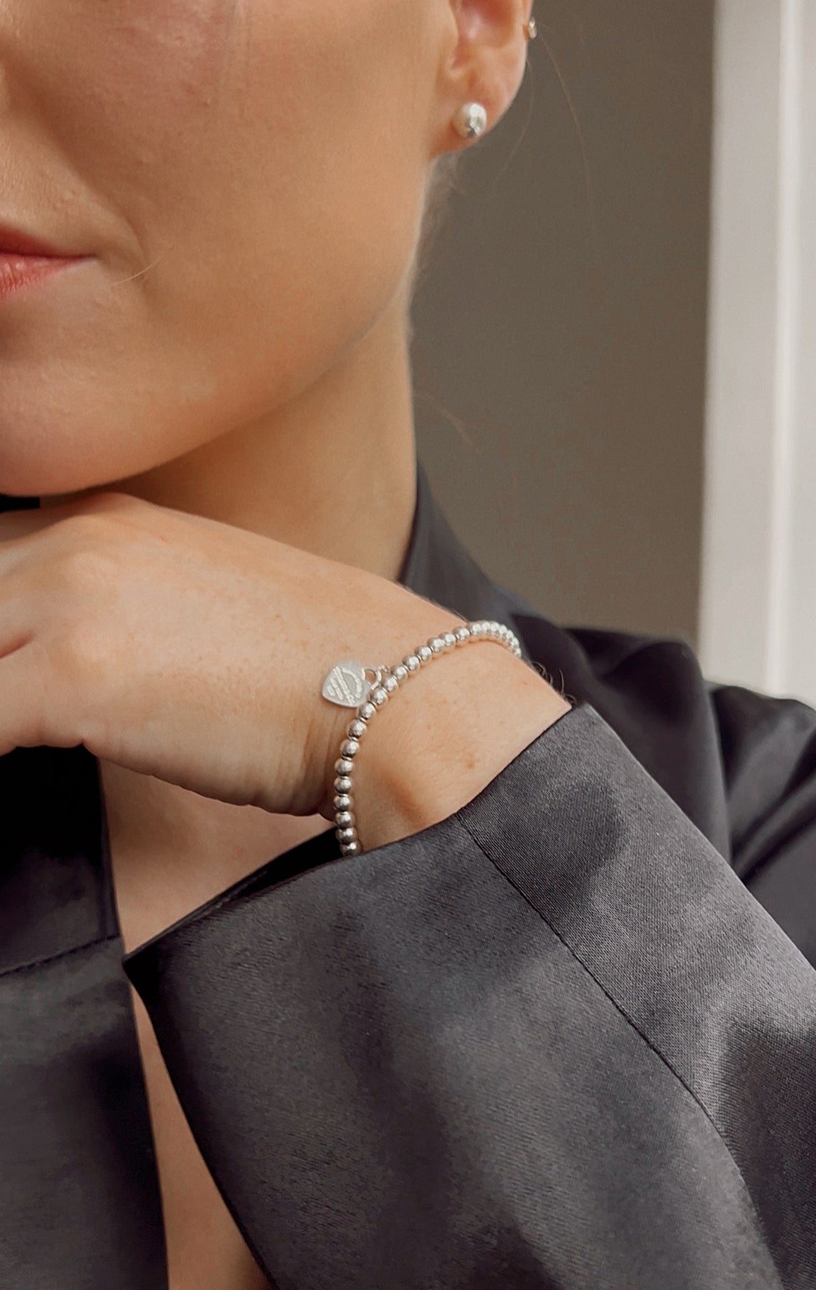 Tiffany & Co. Red Heart Tag Bracelet in Silver