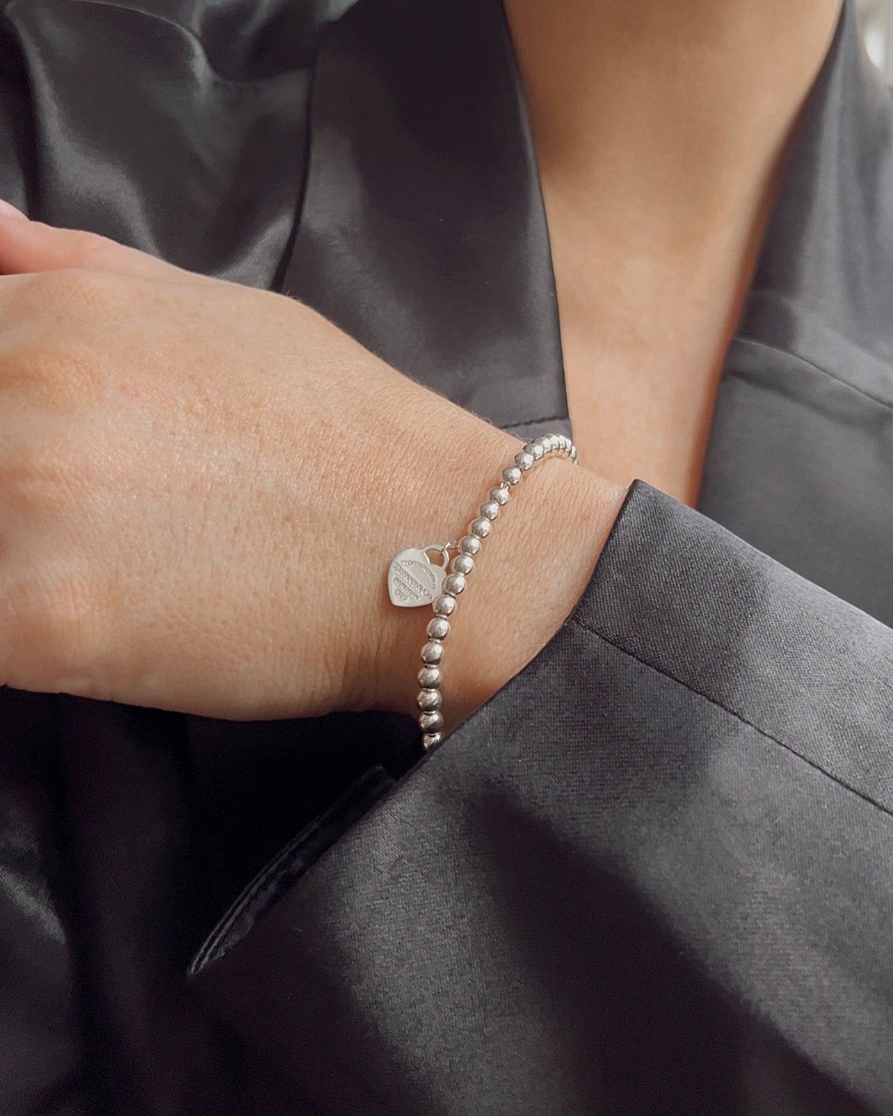 Tiffany & Co. Red Heart Tag Bracelet in Silver