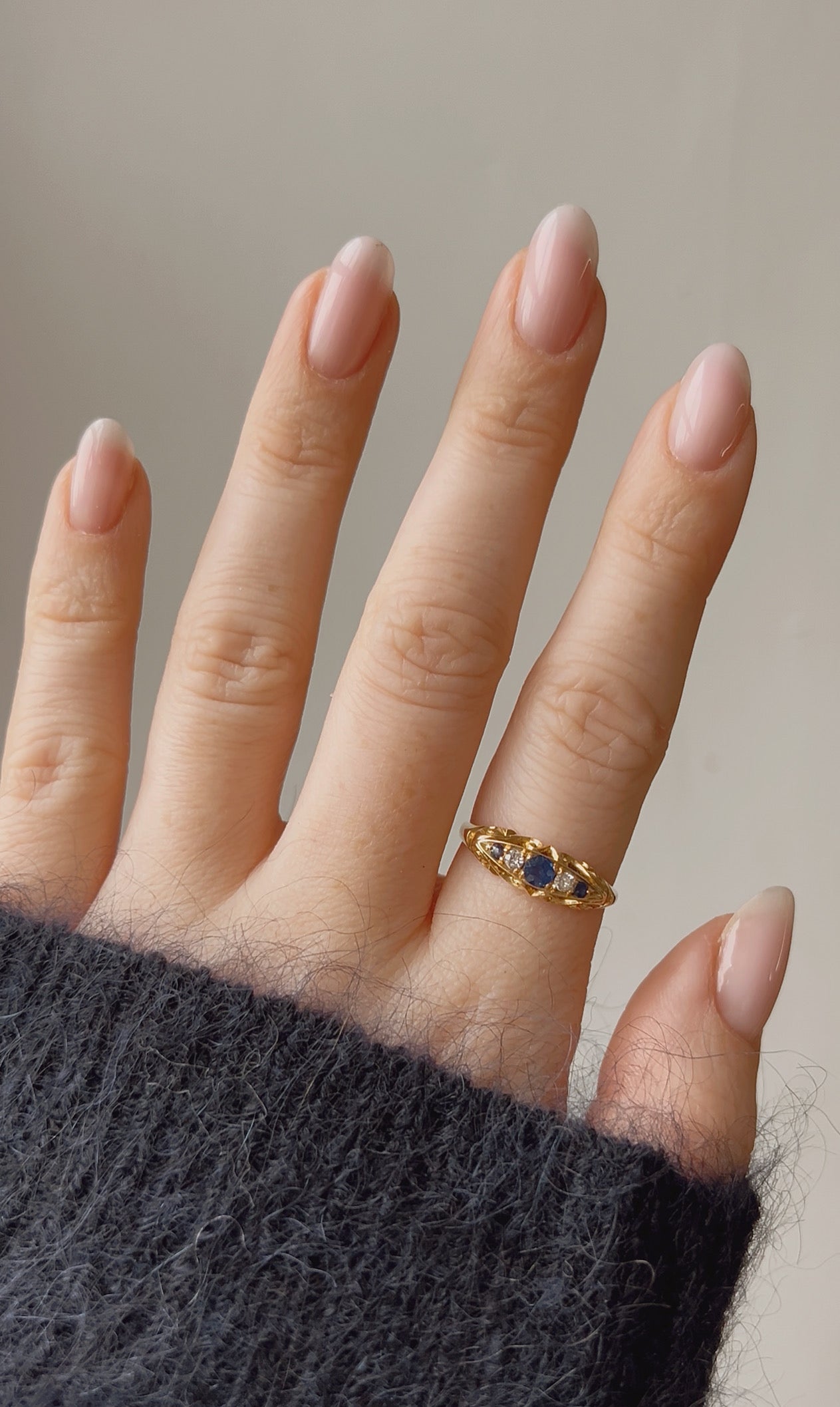 A lovely Early 20th Century 18ct Gold, Blue Sapphire and Diamond Five Stone Ring
